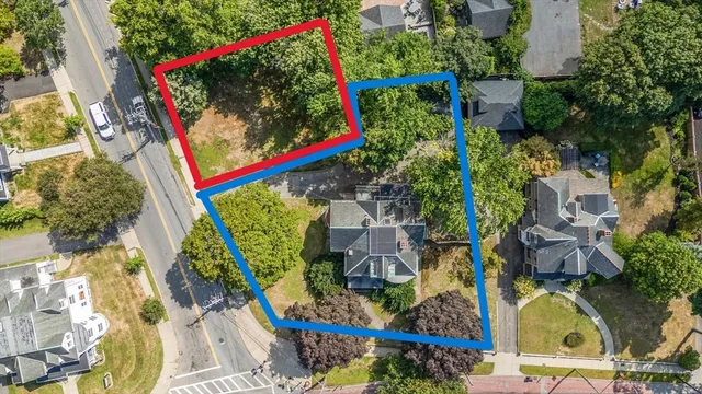 an aerial view of a houses with outdoor space
