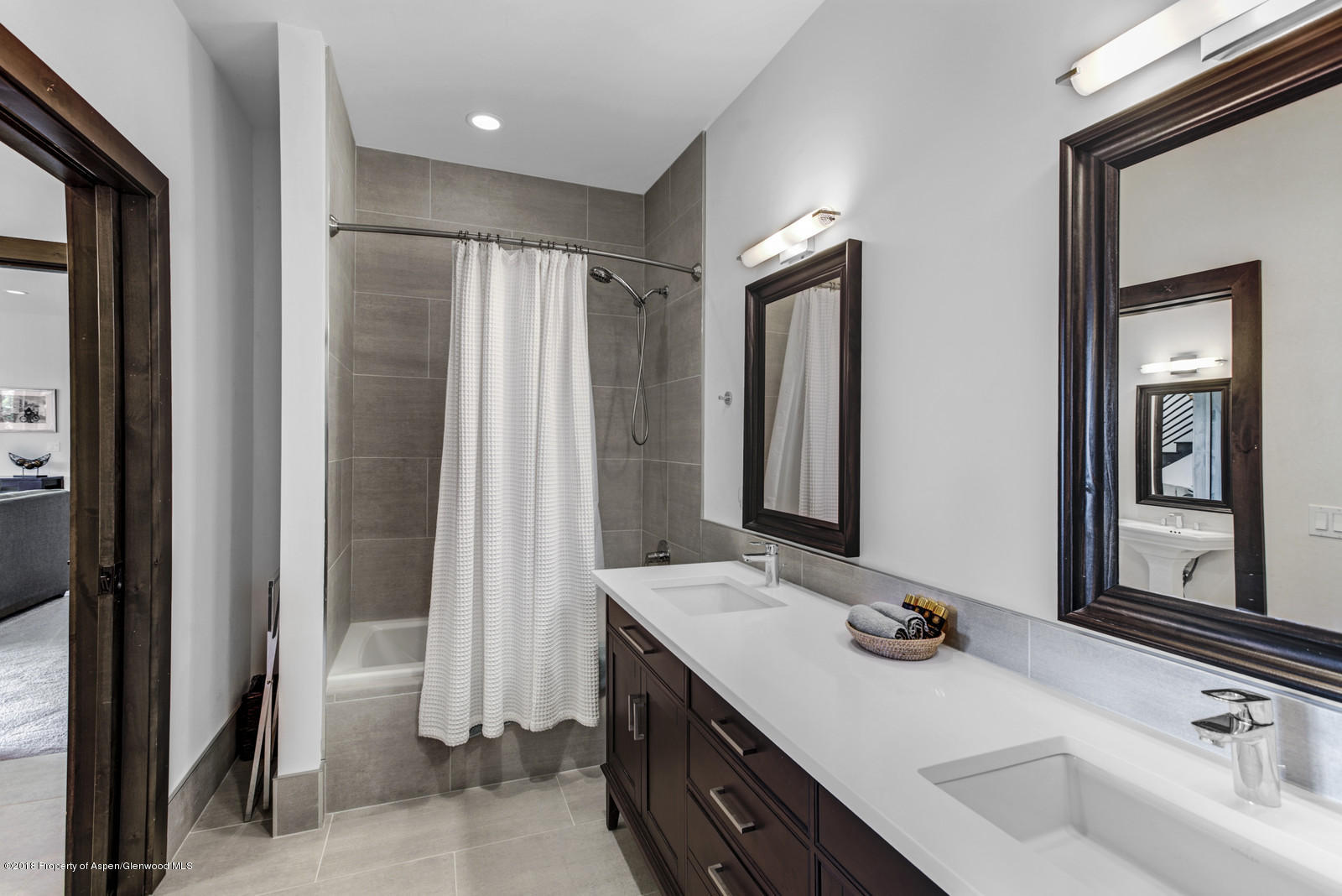 1003 Cattle Creek Ridge Road Carbondale, CO 81623 - Photo 28 of 57 a bathroom with a sink and a mirror