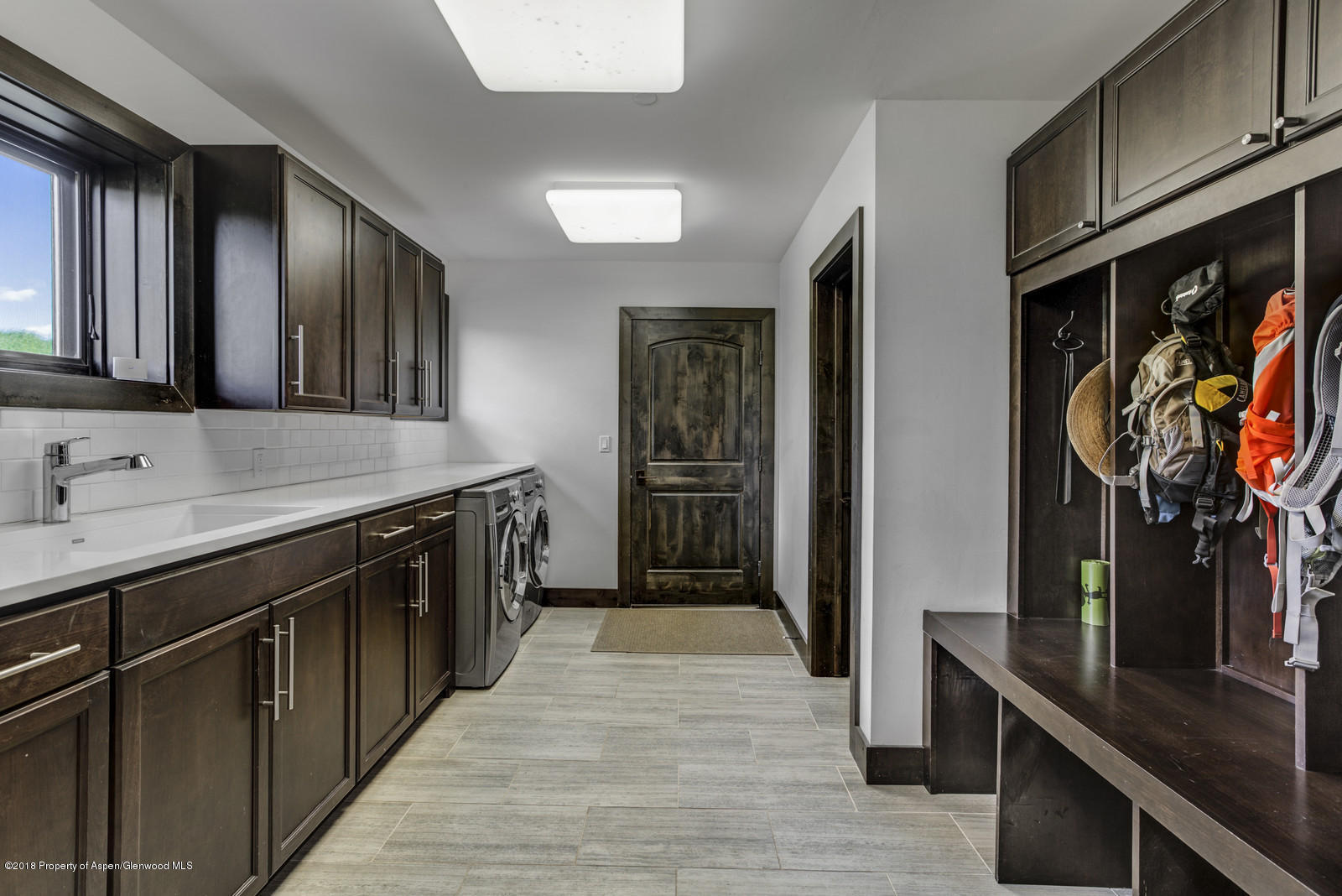 1003 Cattle Creek Ridge Road Carbondale, CO 81623 - Photo 32 of 57 a kitchen with stainless steel appliances granite countertop a sink stove and cabinets