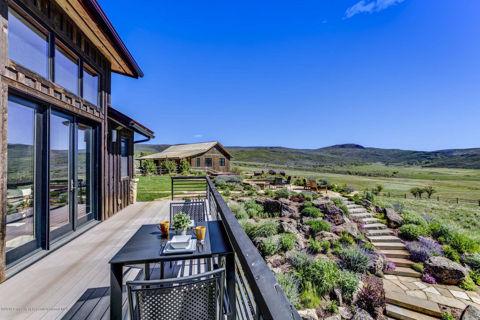 1003 Cattle Creek Ridge Road Carbondale, CO 81623 - Photo 34 of 57 a view of a balcony with an ocean view