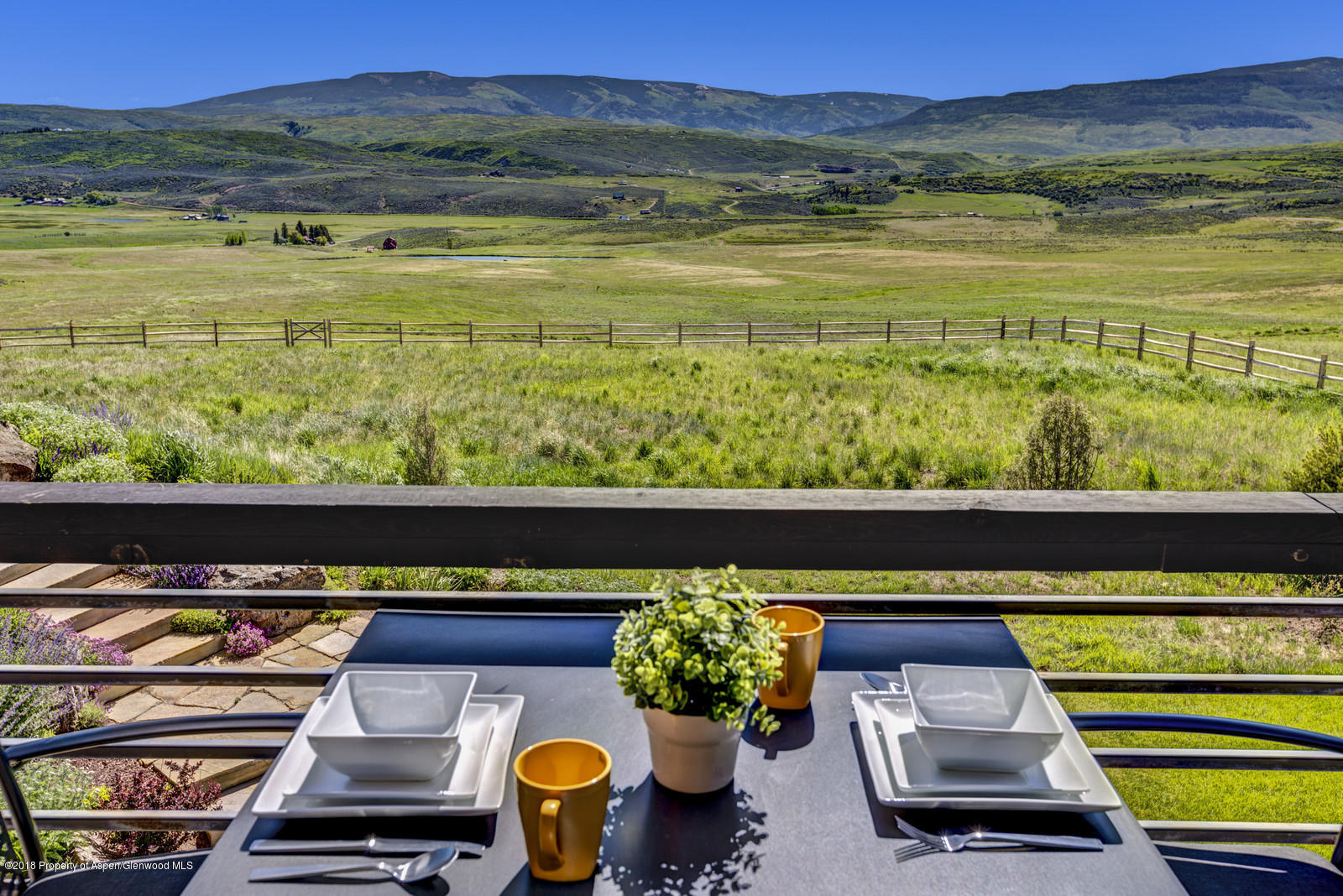 1003 Cattle Creek Ridge Road Carbondale, CO 81623 - Photo 35 of 57 a view of a swimming pool with a patio