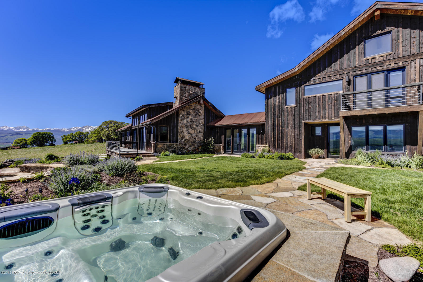 1003 Cattle Creek Ridge Road Carbondale, CO 81623 - Photo 41 of 57 a view of backyard with swimming pool and outdoor seating