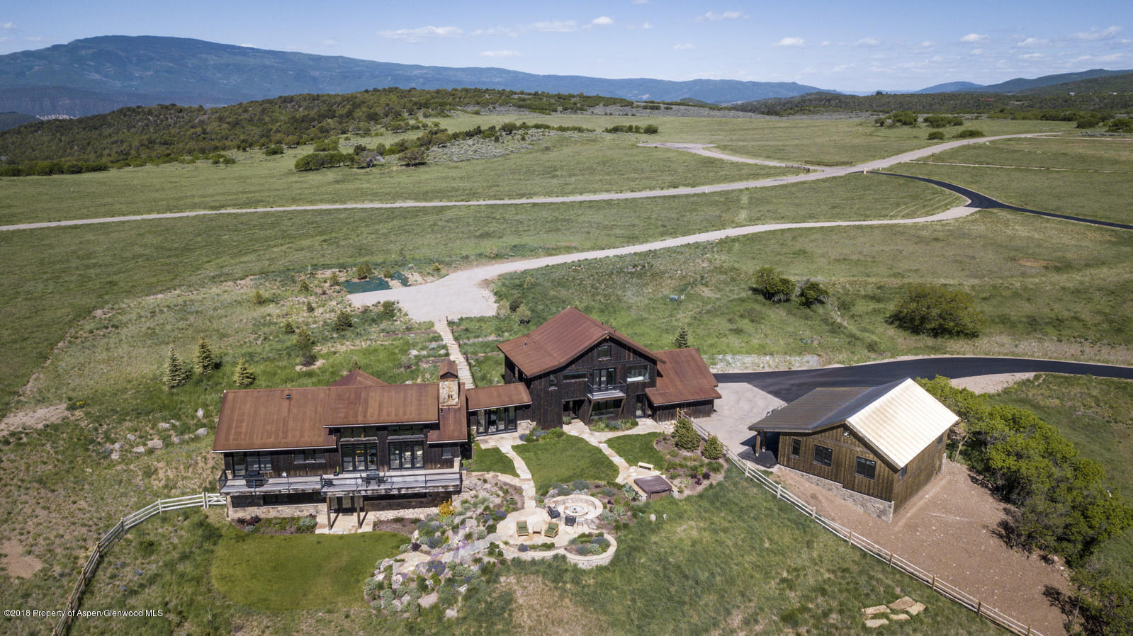 1003 Cattle Creek Ridge Road Carbondale, CO 81623 - Photo 49 of 57 an aerial view of a house with a garden