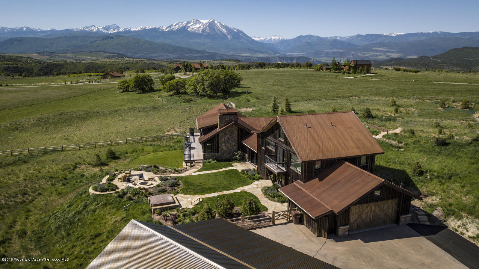 1003 Cattle Creek Ridge Road Carbondale, CO 81623 - Photo 51 of 57 an aerial view of a house with a garden