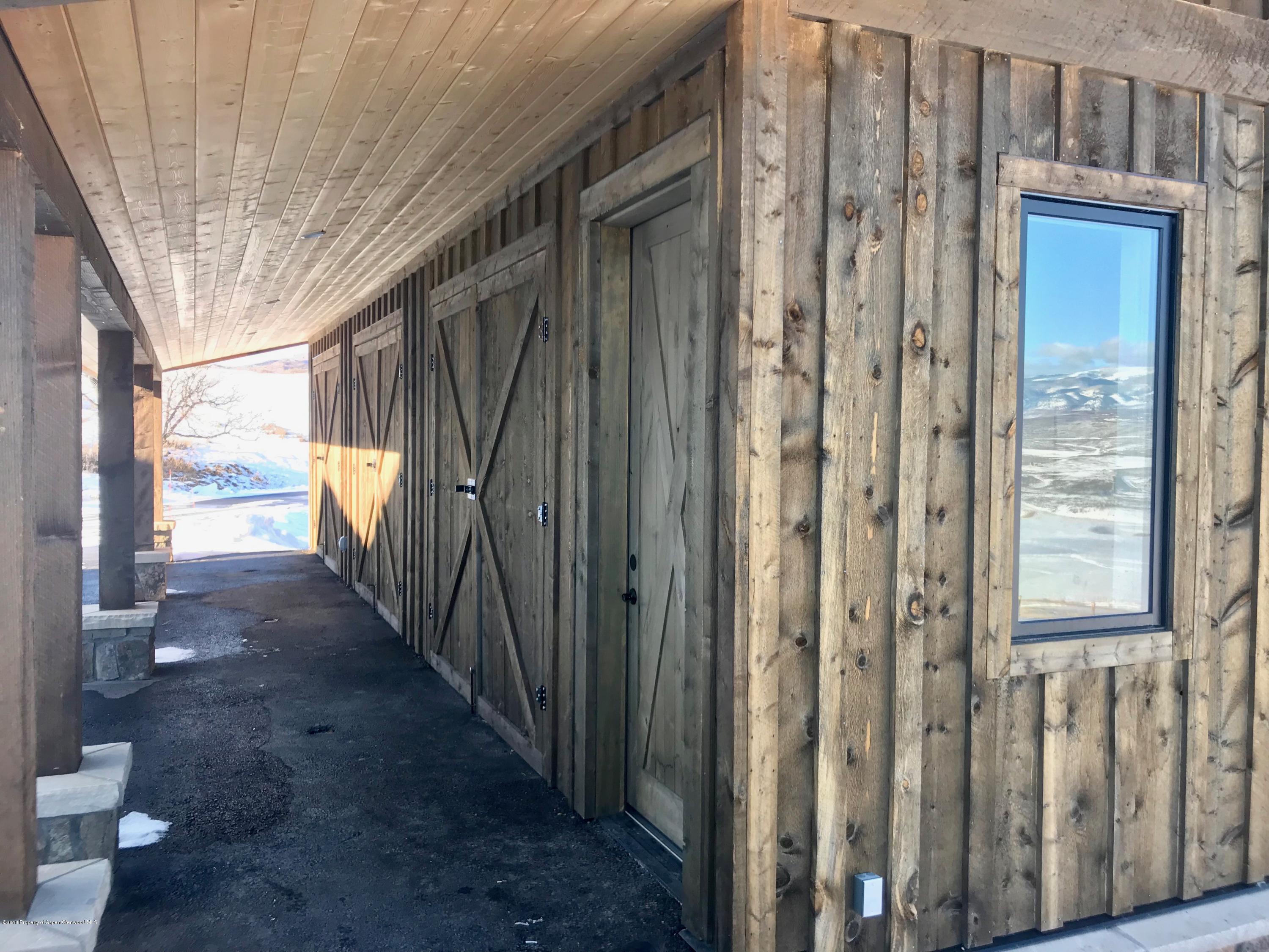 1003 Cattle Creek Ridge Road Carbondale, CO 81623 - Photo 56 of 57 a view of a house with a backyard