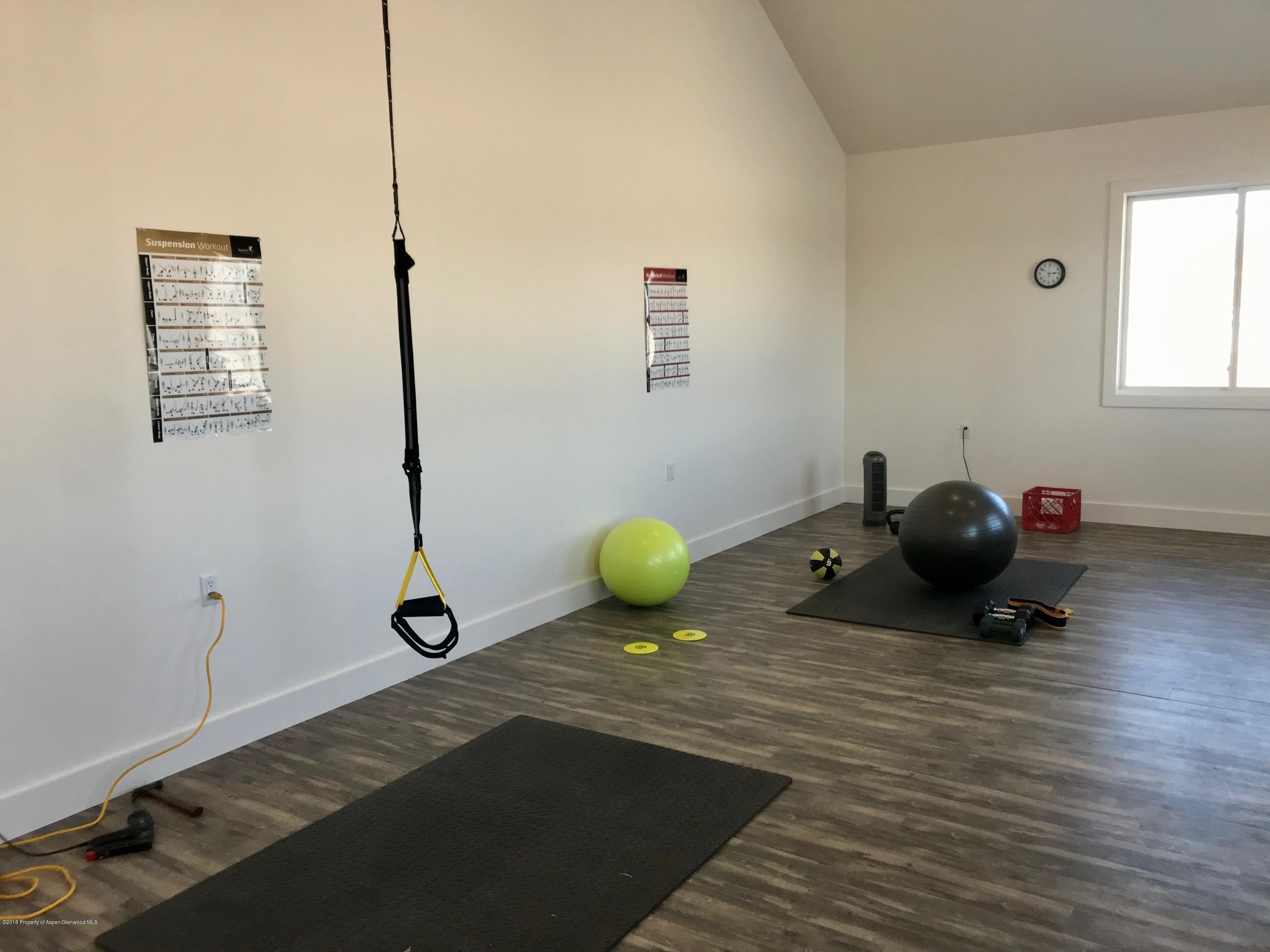 1003 Cattle Creek Ridge Road Carbondale, CO 81623 - Photo 57 of 57 a view of a room with table and chairs
