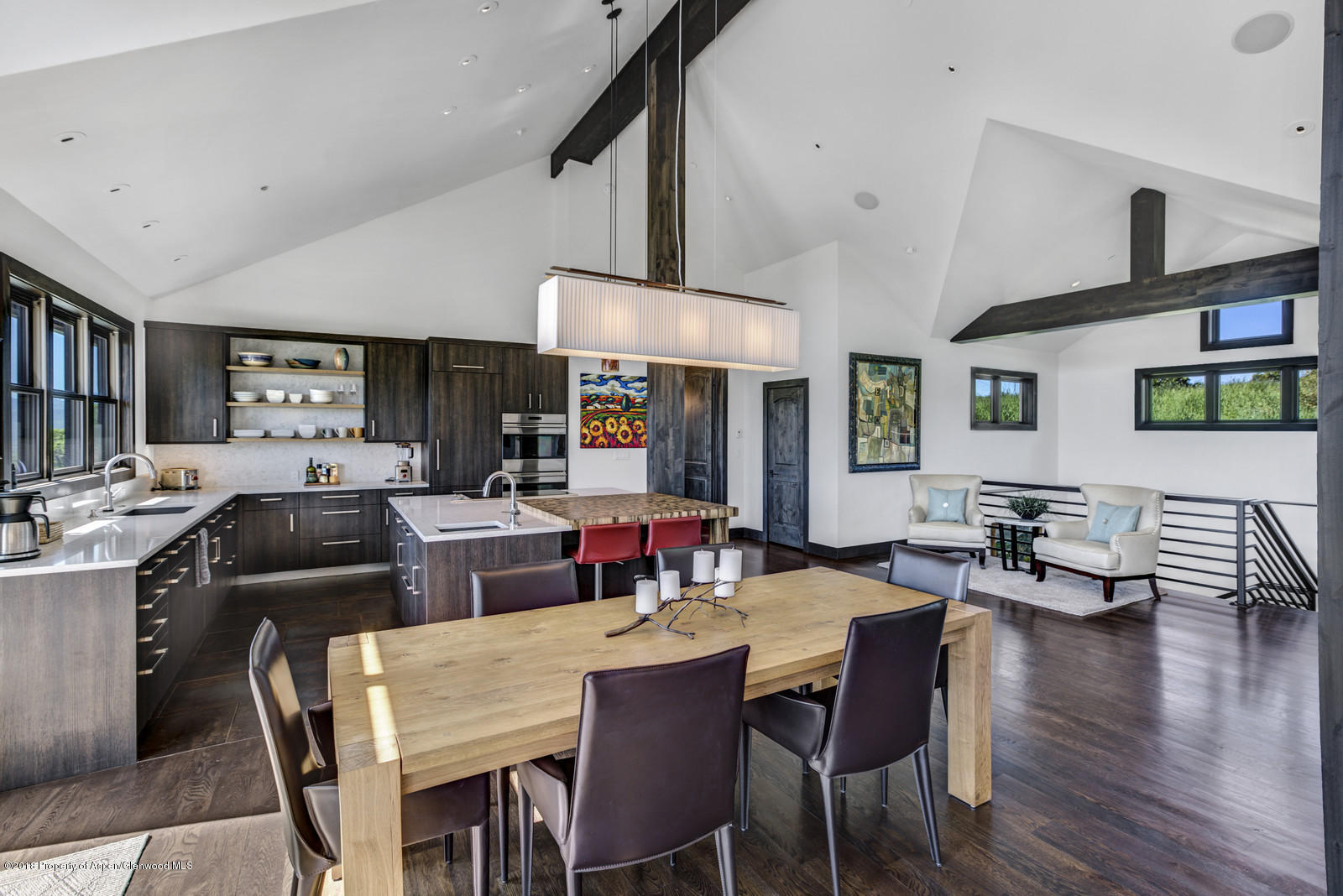 1003 Cattle Creek Ridge Road Carbondale, CO 81623 - Photo 8 of 57 a view of a dining room with furniture and wooden floor