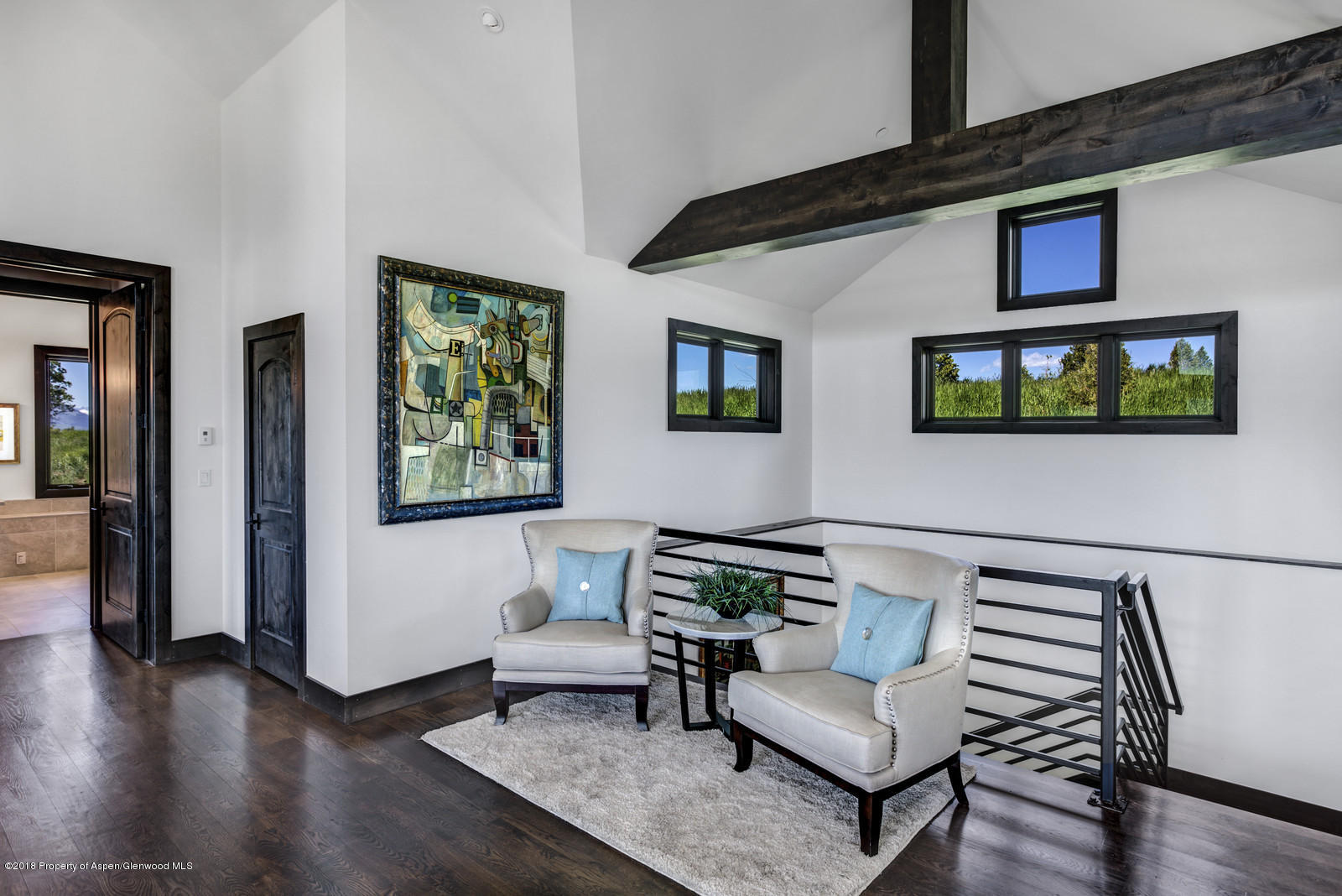 1003 Cattle Creek Ridge Road Carbondale, CO 81623 - Photo 10 of 57 a living room with furniture and wooden floor
