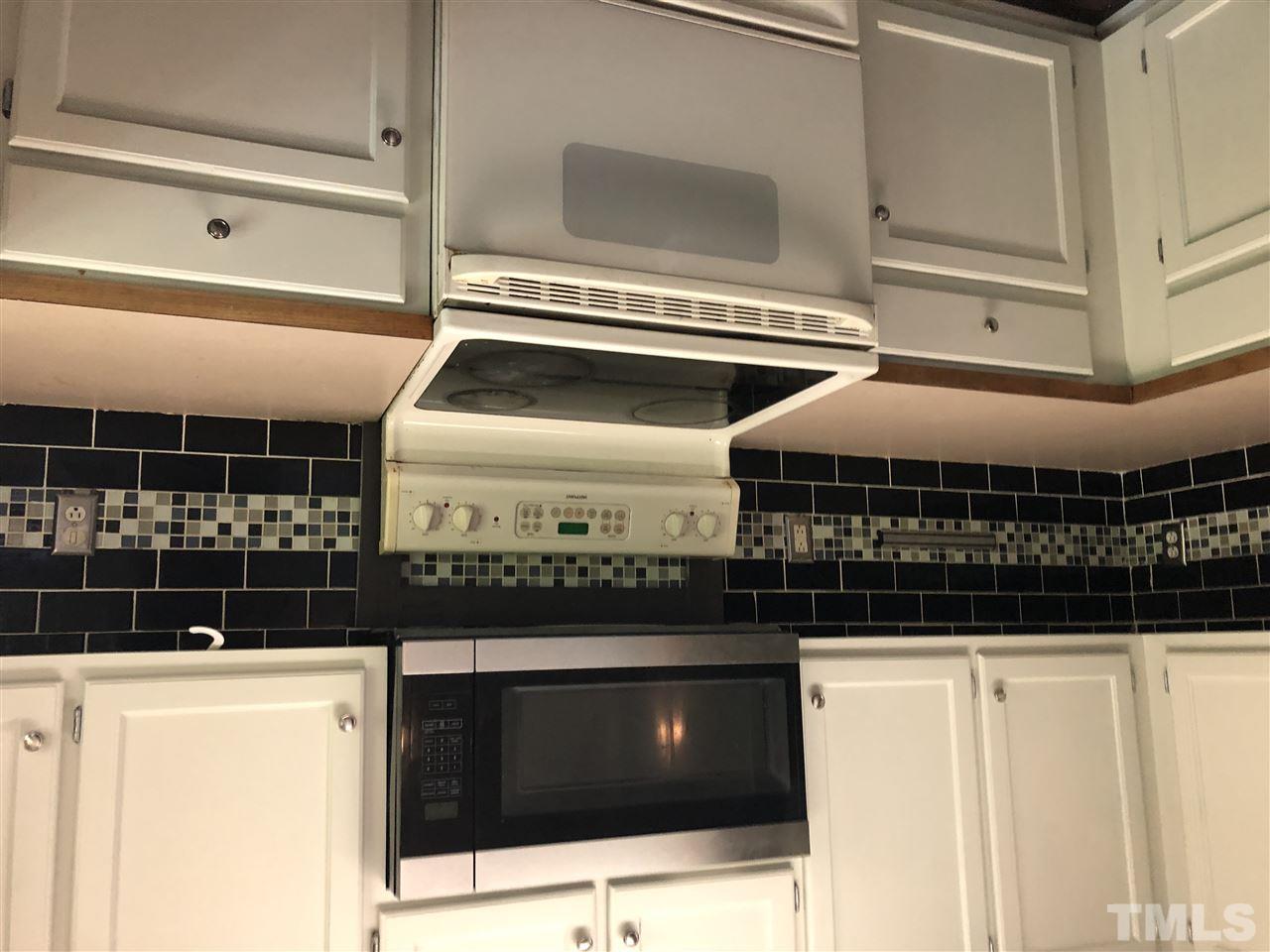 2518 Siler Road Snow Camp, NC 27349 - Photo 7 of 24 Being replaced with stainless electric range.