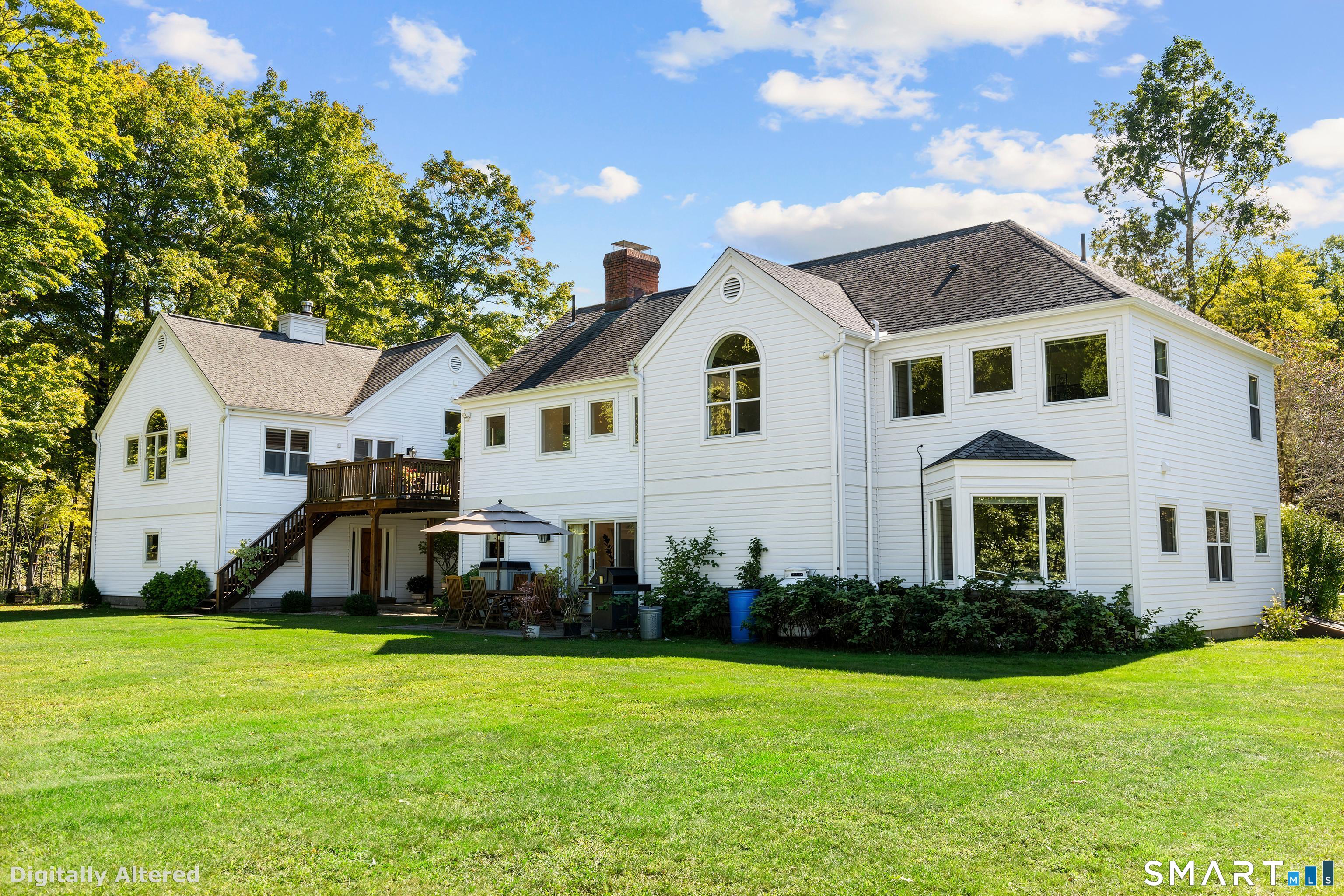 92 Quail Run Road Woodbury, CT 06798 - Photo 34 of 40 Back of house shown with siding completed