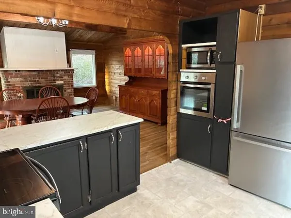 a kitchen with a sink and a window