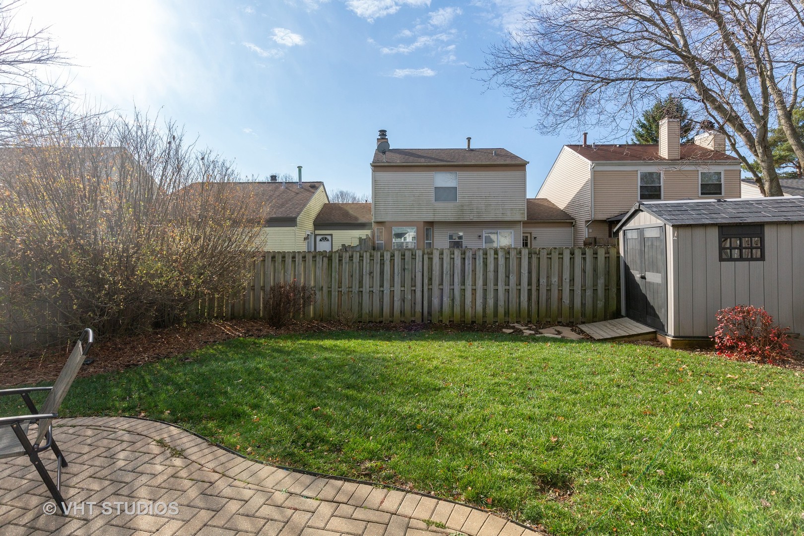 1031 Perry Drive Algonquin, IL 60102 - Photo 2 of 10 a view of a house with a yard and hanging chair