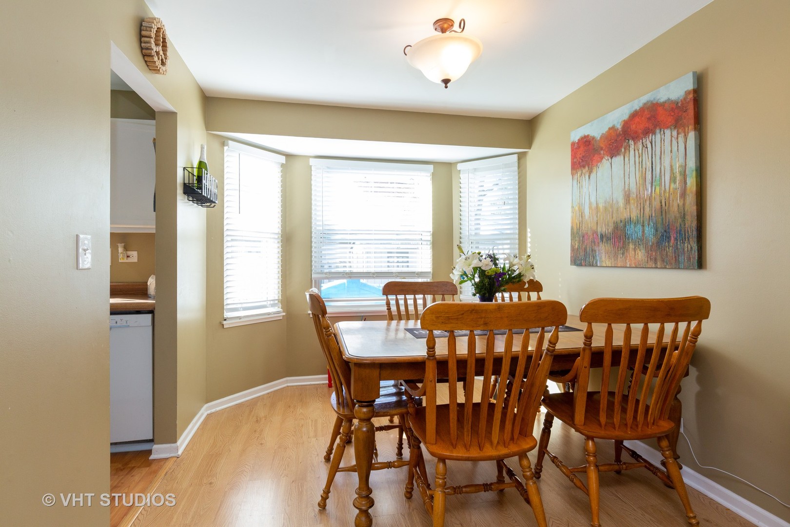 1031 Perry Drive Algonquin, IL 60102 - Photo 5 of 10 a view of a dining room with furniture window and outside view