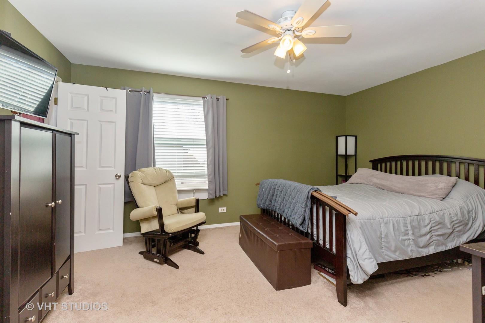1031 Perry Drive Algonquin, IL 60102 - Photo 9 of 10 a bedroom with a bed and a window