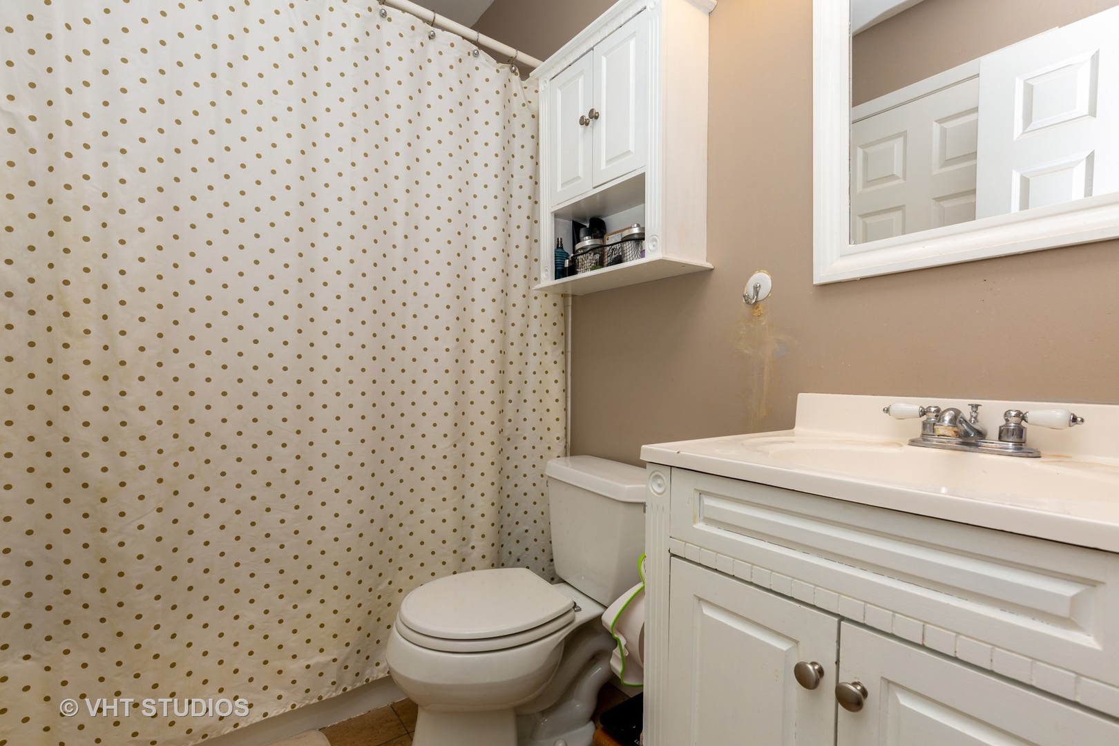 1031 Perry Drive Algonquin, IL 60102 - Photo 10 of 10 a bathroom with a sink a toilet and a window