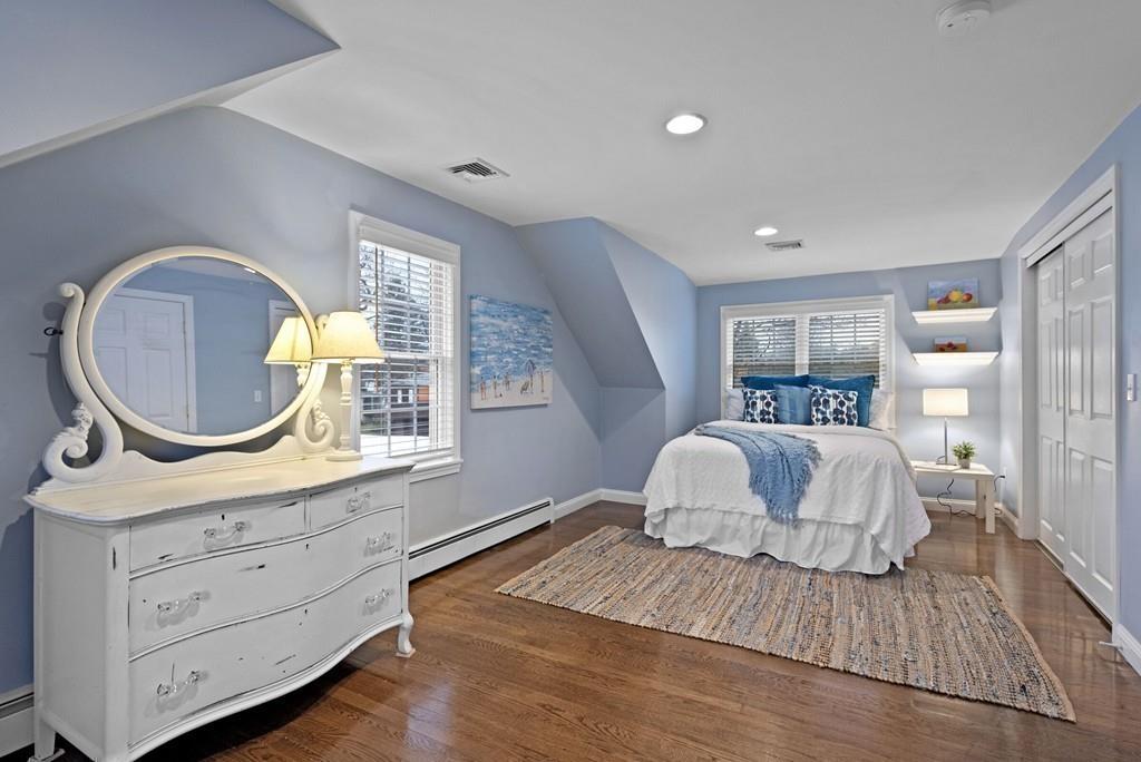 12 Hawthorn Road Marblehead, MA 01945 - Photo 17 of 35 a bedroom with a bed and a dresser