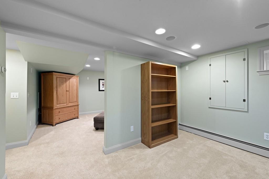 12 Hawthorn Road Marblehead, MA 01945 - Photo 26 of 35 a view of an empty room with a cabinet and mirrors