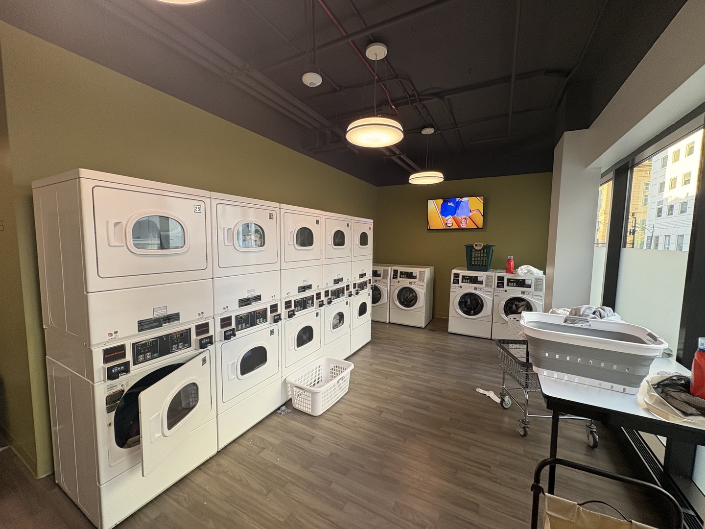 8 West Chestnut Street, Unit 21F Chicago, IL 60610 - Photo 19 of 19 a living room with hard wood flooring and furniture
