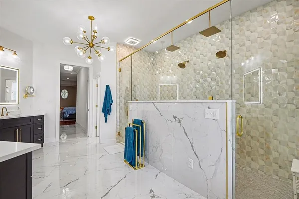 a view of bathroom with a sink toilet and a mirror
