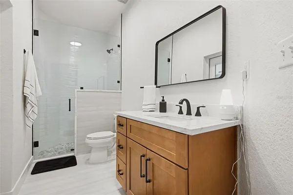 a room with furniture and a book shelf