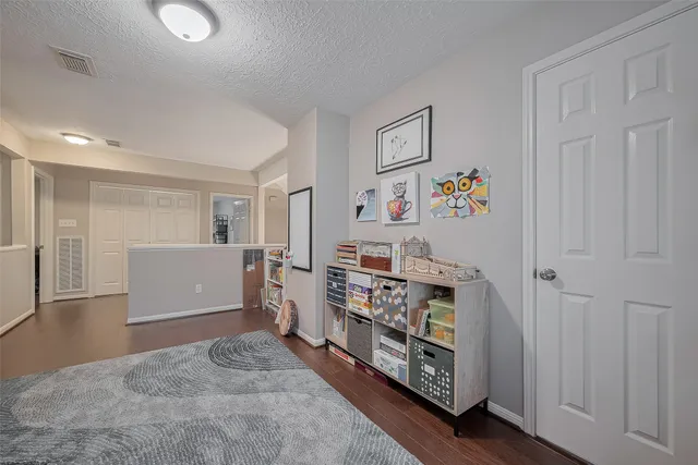 a view of a hallway with workspace