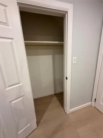 a view of an empty walk in closet