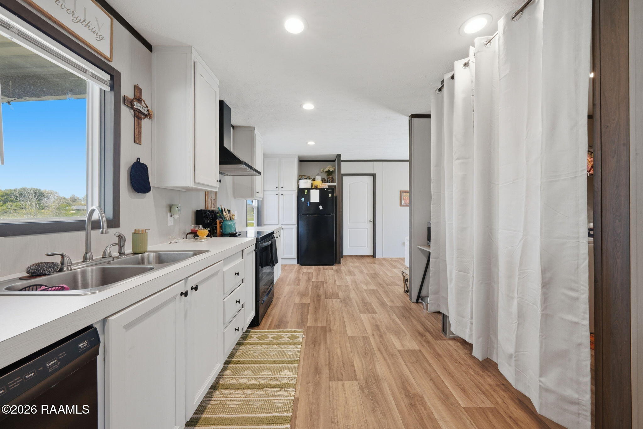 154 Bearb Road Sunset, LA 70584 - Photo 8 of 22 KitchenfromLivingRoom