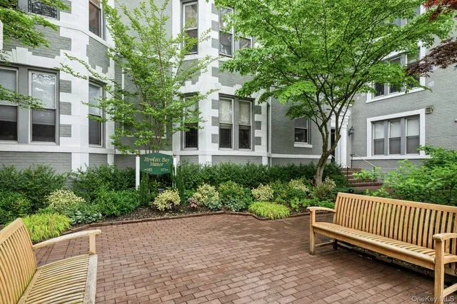 a house view with a garden space