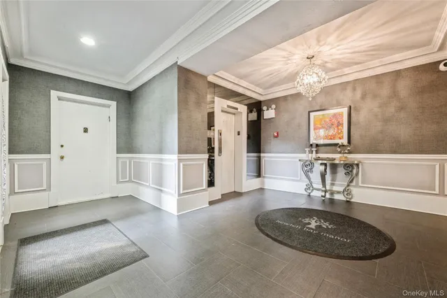 a view of a livingroom with furniture and a table