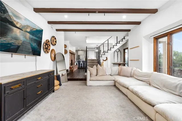 a view of a house with a yard and sitting area