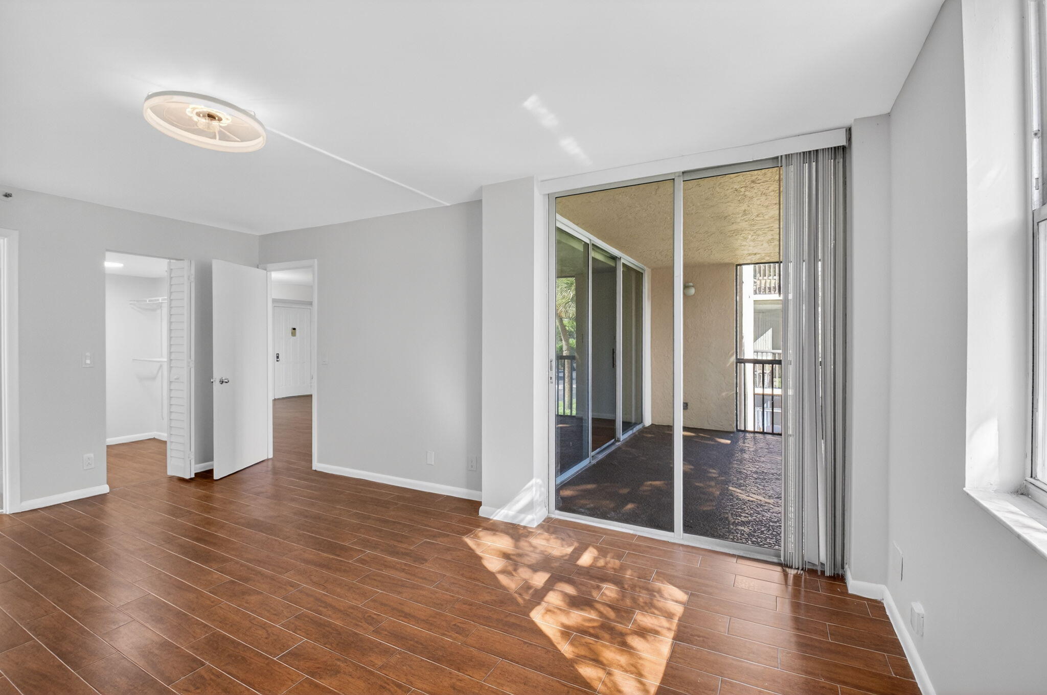 5260 Northwest 2nd Avenue, Unit 206 Boca Raton, FL 33487 - Photo 24 of 36 a view of entryway with wooden floor