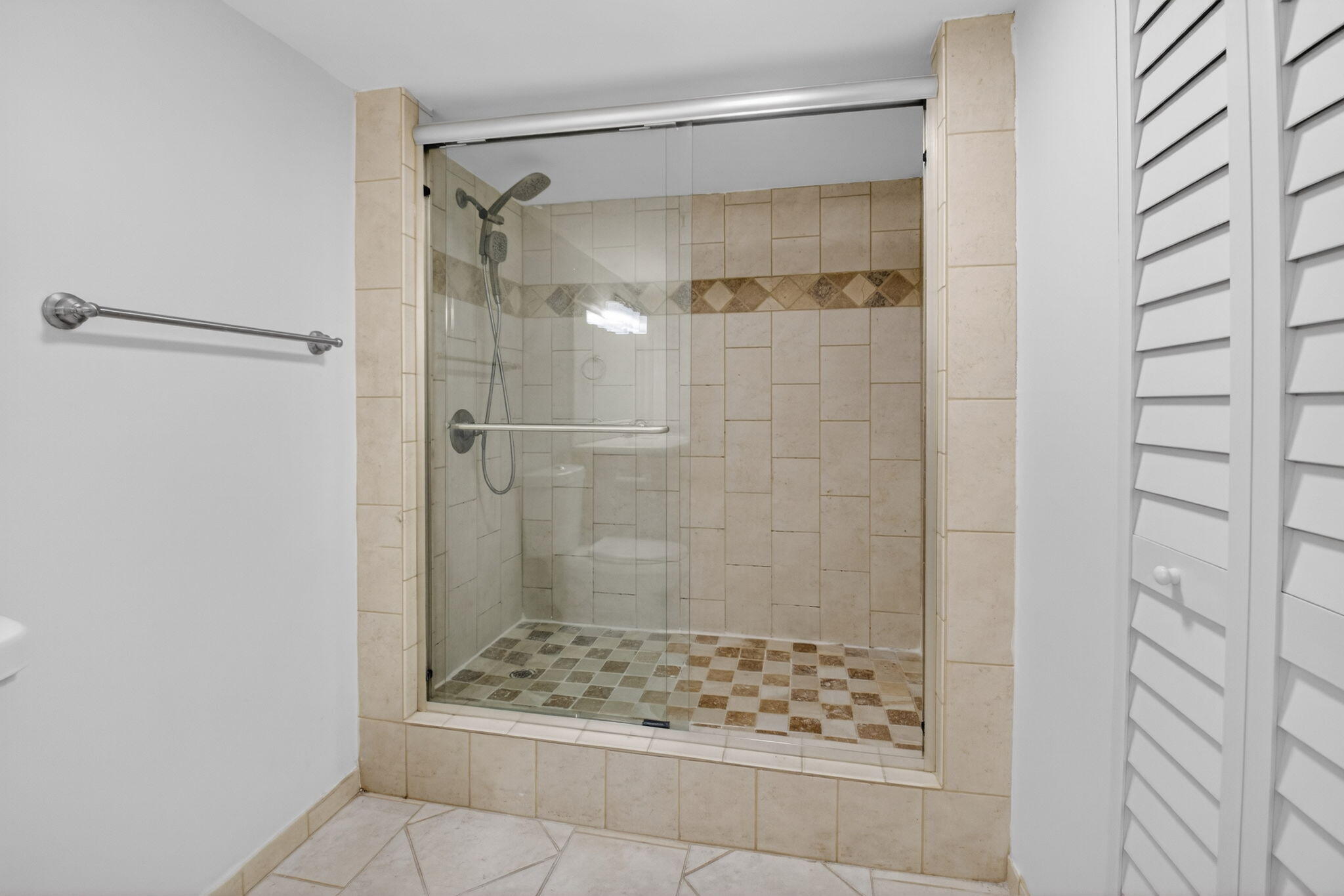 5260 Northwest 2nd Avenue, Unit 206 Boca Raton, FL 33487 - Photo 28 of 36 a bathroom with a shower