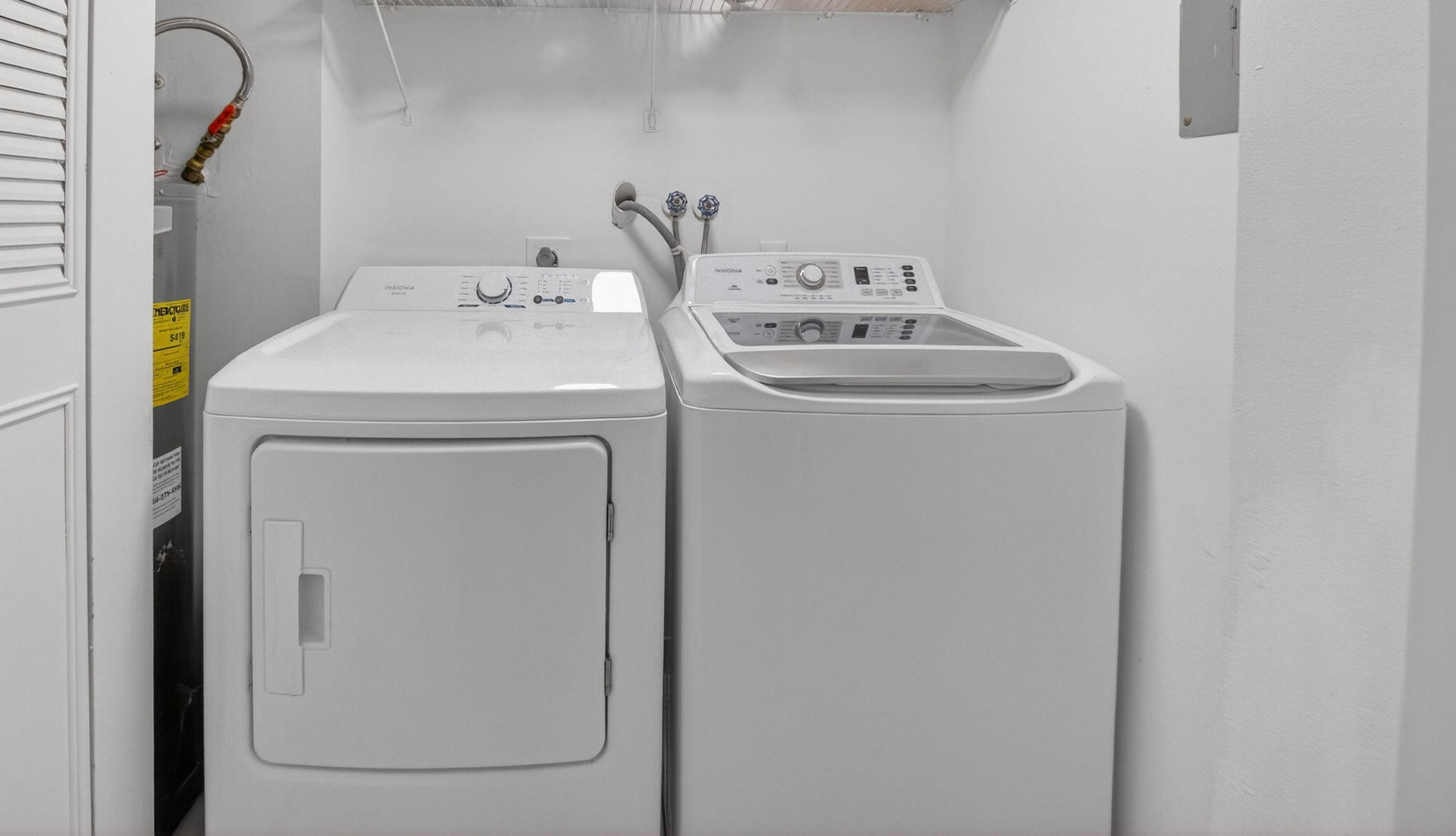 5260 Northwest 2nd Avenue, Unit 206 Boca Raton, FL 33487 - Photo 30 of 36 a utility room with dryer and washer