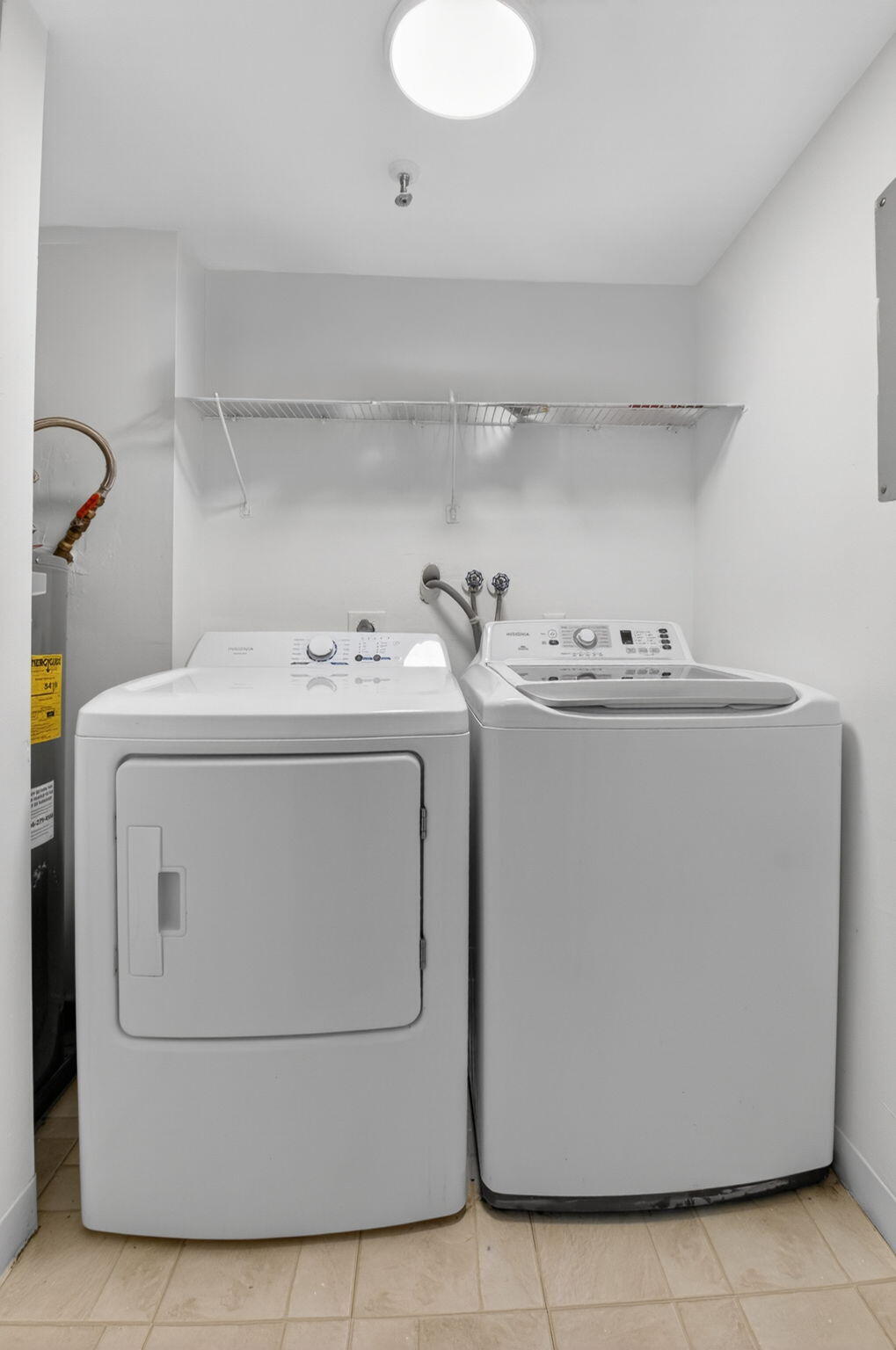5260 Northwest 2nd Avenue, Unit 206 Boca Raton, FL 33487 - Photo 31 of 36 a utility room with dryer and washer