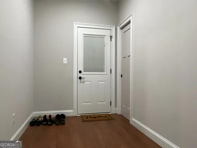 an empty room with a door