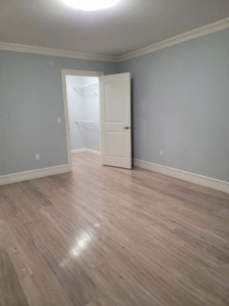 10 Lower Notch Road, Unit 8 Woodland Park, NJ 07424 - Photo 13 of 37 a view of an empty room with wooden floor and a window