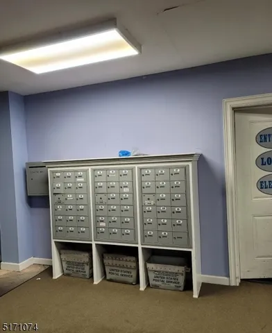 a view of a livingroom with furniture and a flat screen tv