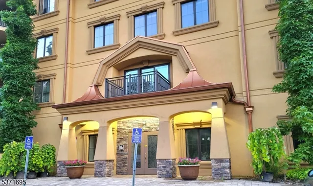 a view of multiple houses with a street