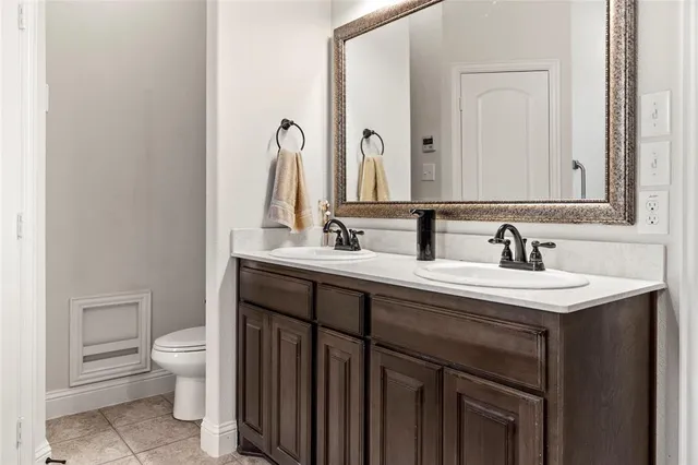 a bathroom with a sink and a toilet