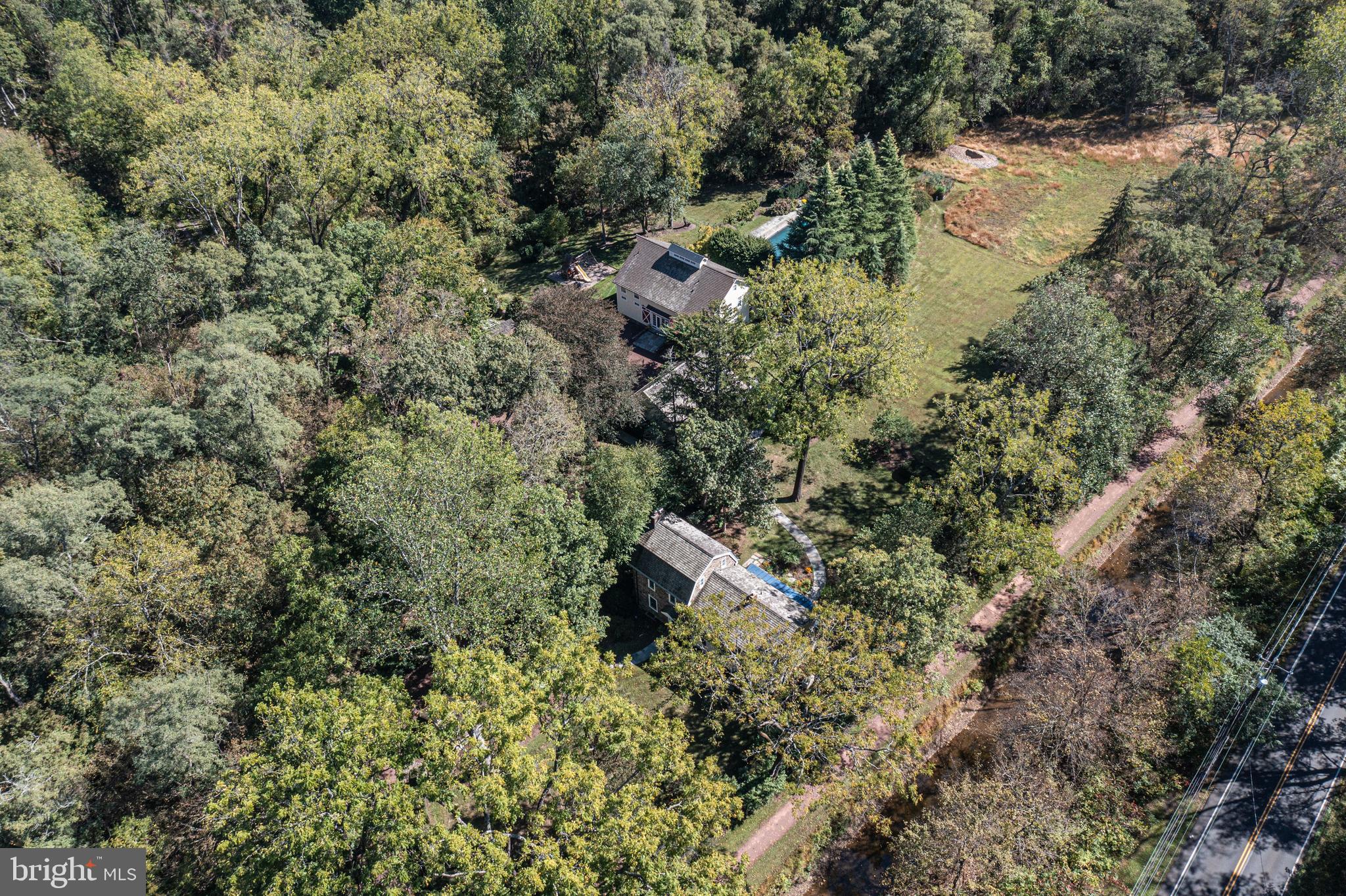 928 Taylorsville Road Washington Crossing, PA 18977 - Photo 105 of 106 an aerial view of residential house with outdoor space and trees all around