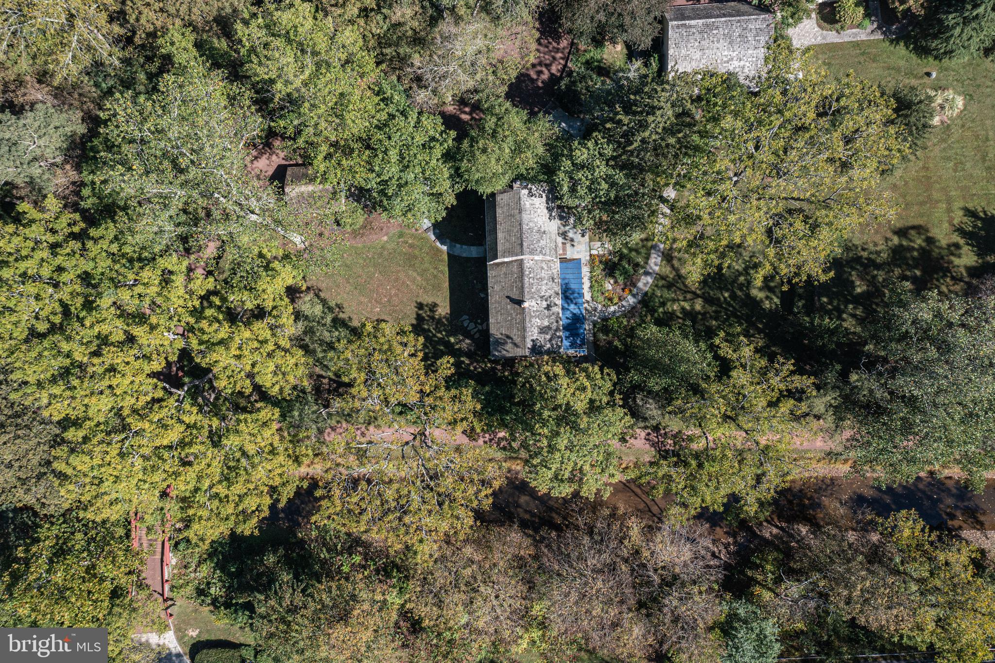 928 Taylorsville Road Washington Crossing, PA 18977 - Photo 106 of 106 an aerial view of residential house with outdoor space and trees all around