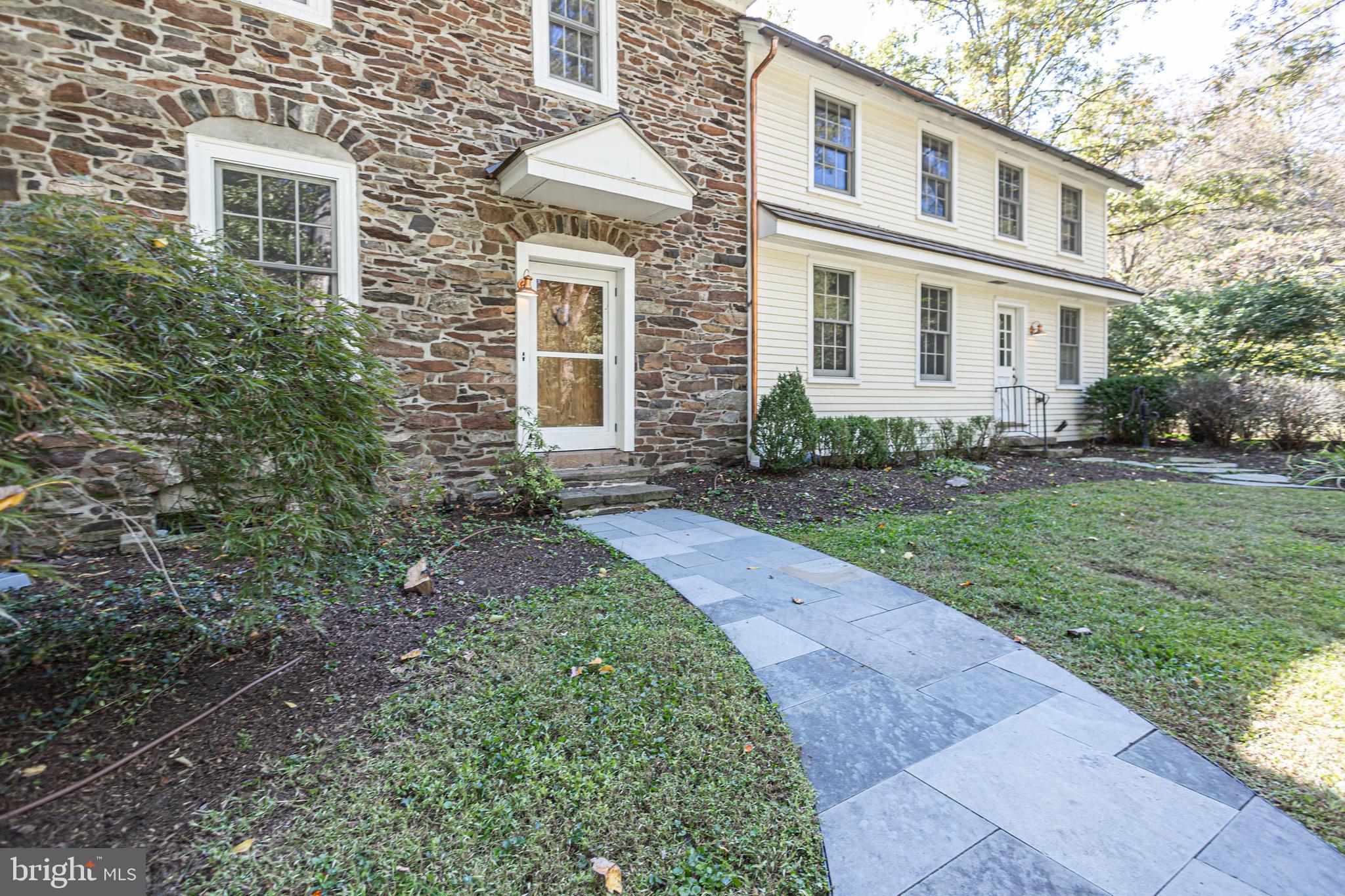 928 Taylorsville Road Washington Crossing, PA 18977 - Photo 12 of 106 a front view of a house with a yard