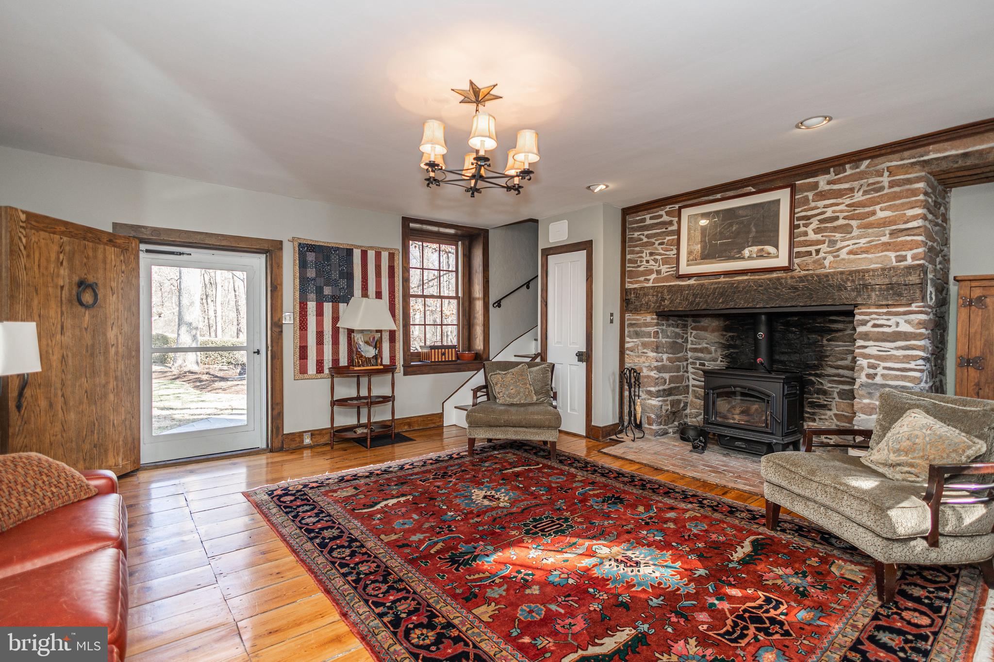 928 Taylorsville Road Washington Crossing, PA 18977 - Photo 15 of 106 a living room with furniture and a fireplace
