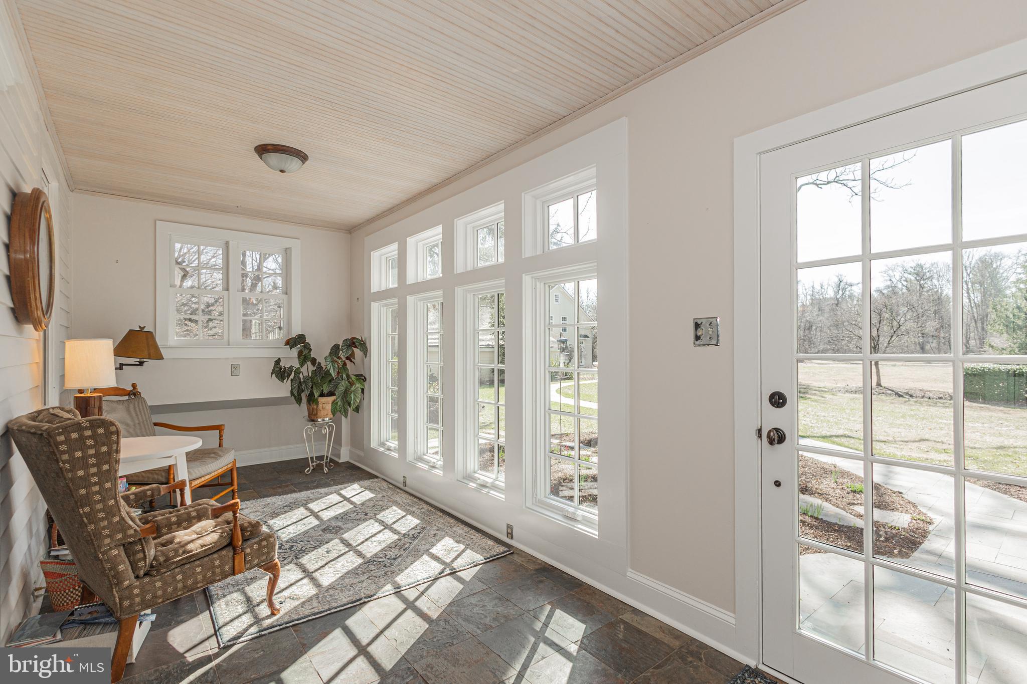 928 Taylorsville Road Washington Crossing, PA 18977 - Photo 20 of 106 a living room with furniture and a large window