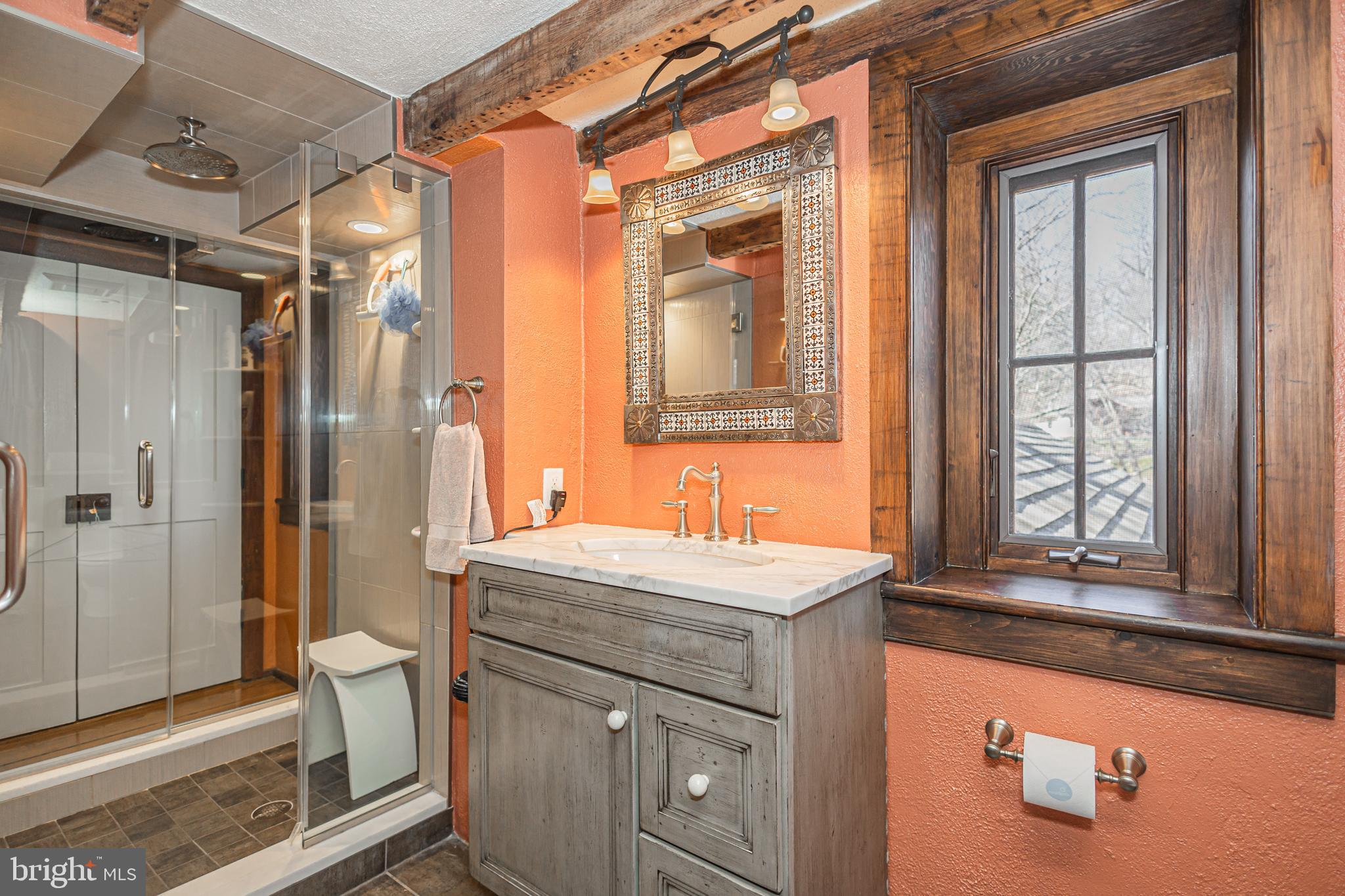 928 Taylorsville Road Washington Crossing, PA 18977 - Photo 30 of 106 a bathroom with a sink and a mirror