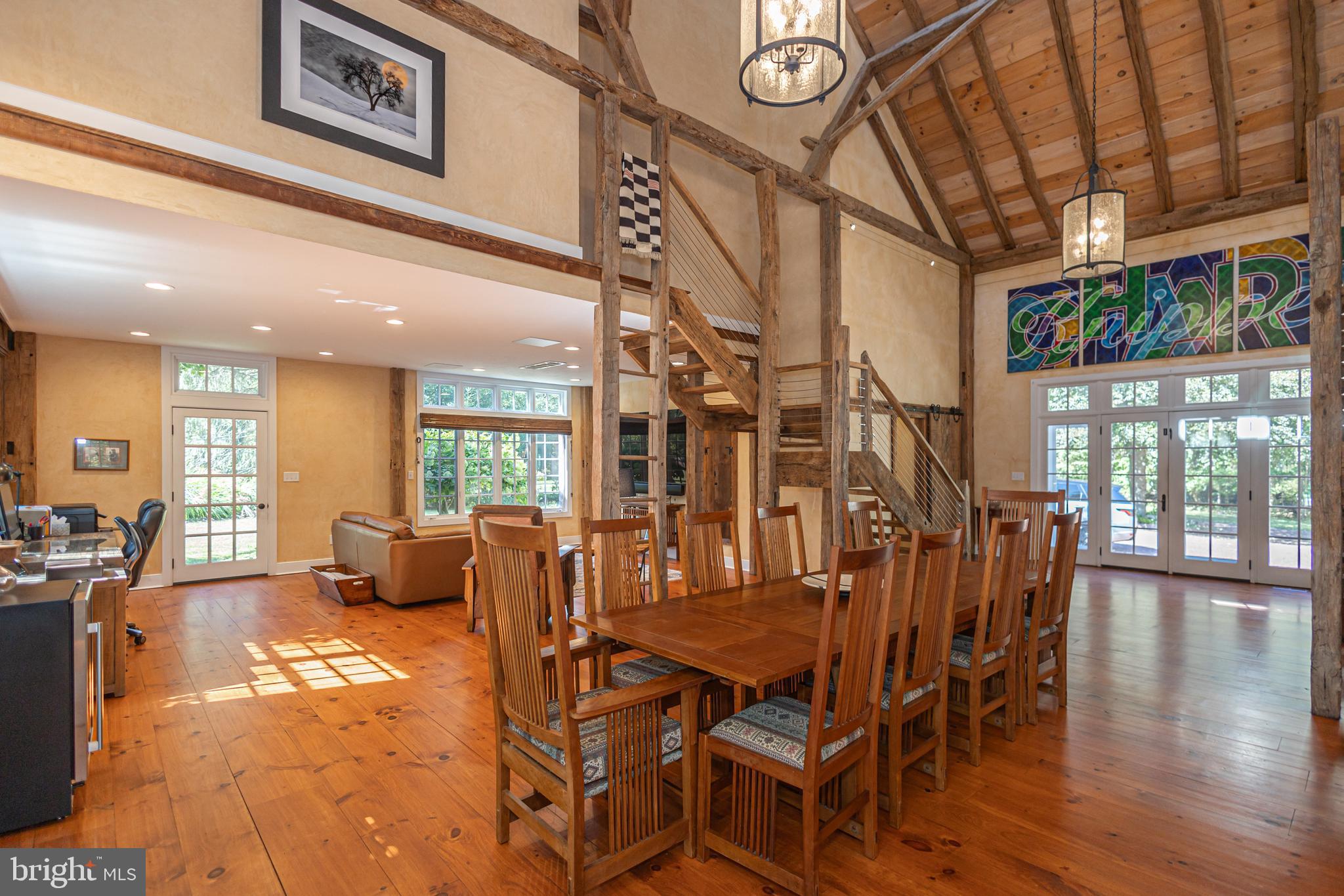 928 Taylorsville Road Washington Crossing, PA 18977 - Photo 46 of 106 a view of a dining room with furniture window and wooden floor