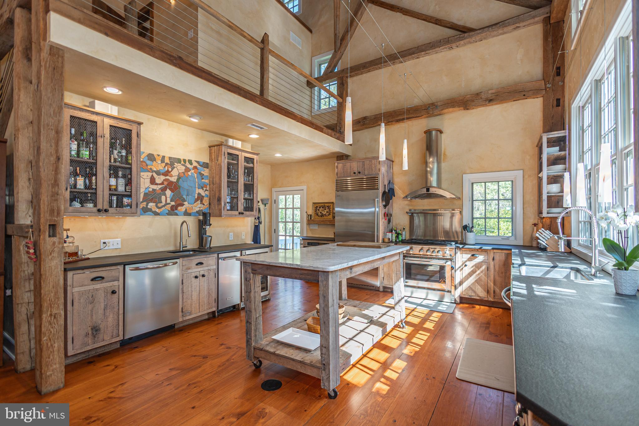 928 Taylorsville Road Washington Crossing, PA 18977 - Photo 49 of 106 a kitchen with stainless steel appliances granite countertop lots of counter top space