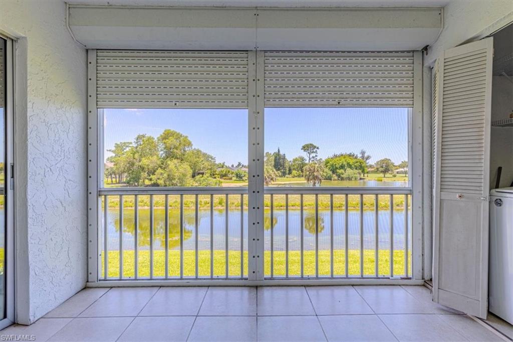5483 Rattlesnake Hammock Road, Unit B201 Naples, FL 34113 - Photo 6 of 22 a view of front door