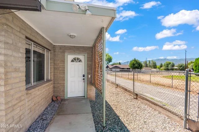 a view of a swimming pool with a chair