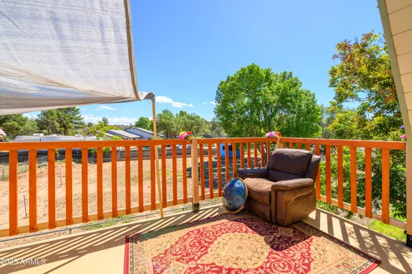 a balcony view with a garden